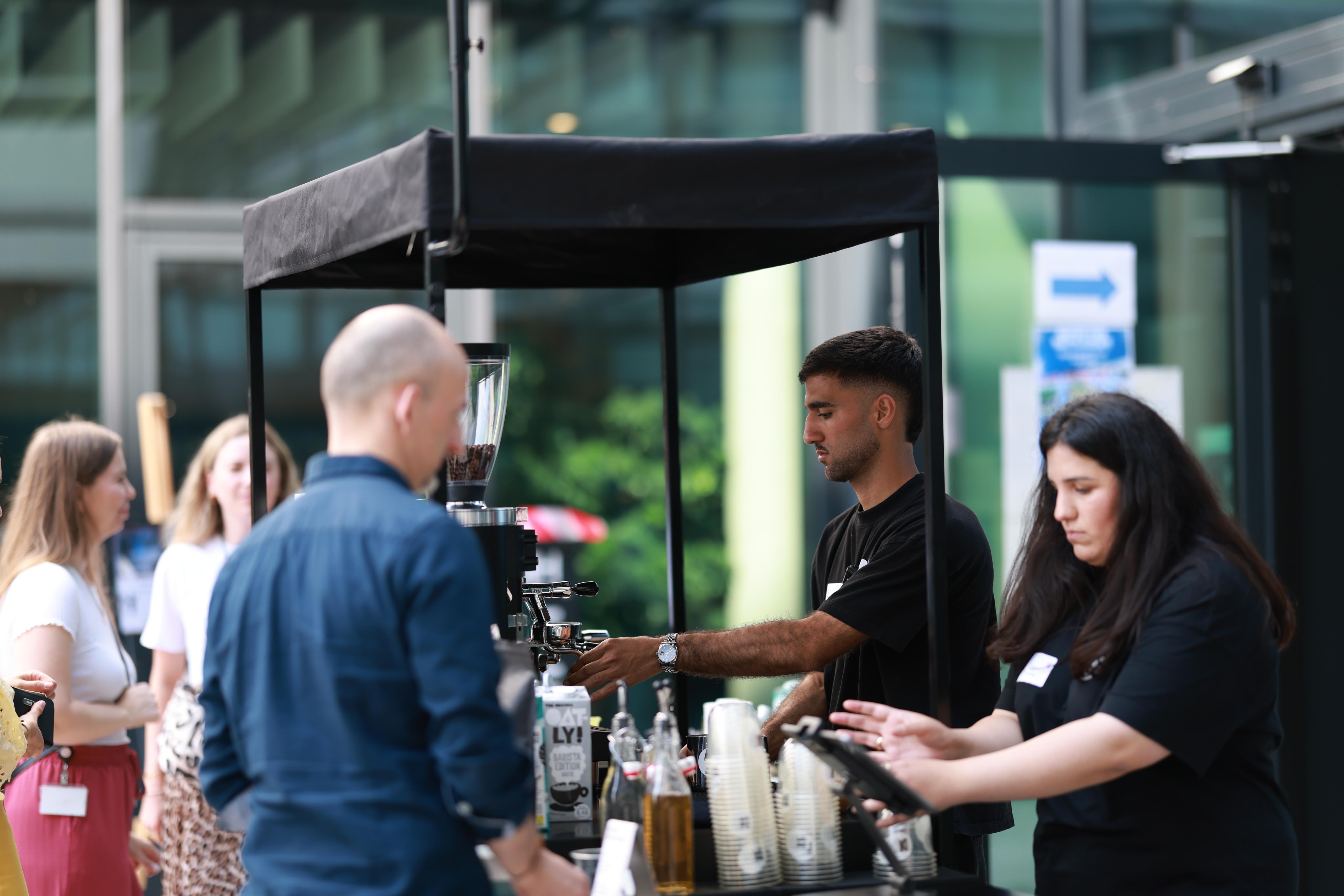 Professional barista crafting coffee